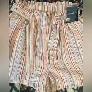 Woman’s striped dress shorts.                         Size -  Small